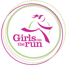 Girls on the Run win a green and purple circle with a purple girl stick figure running